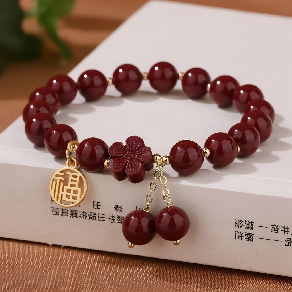 Women's cinnabar bracelet with fu character design and tassel in national style