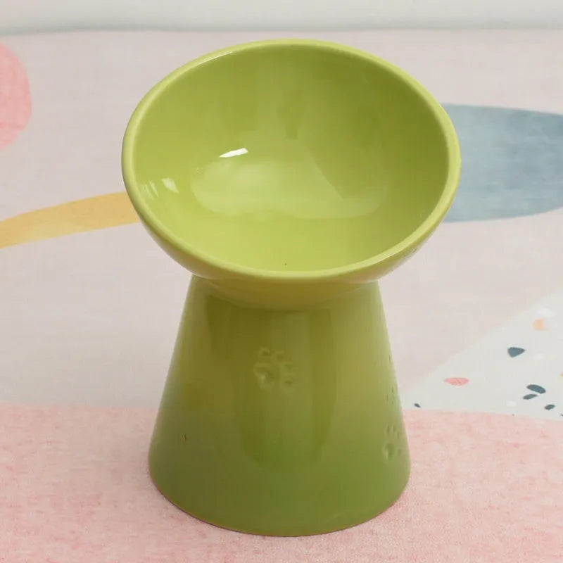 High-foot ceramic pet bowl with chin protector and anti-tumble base design